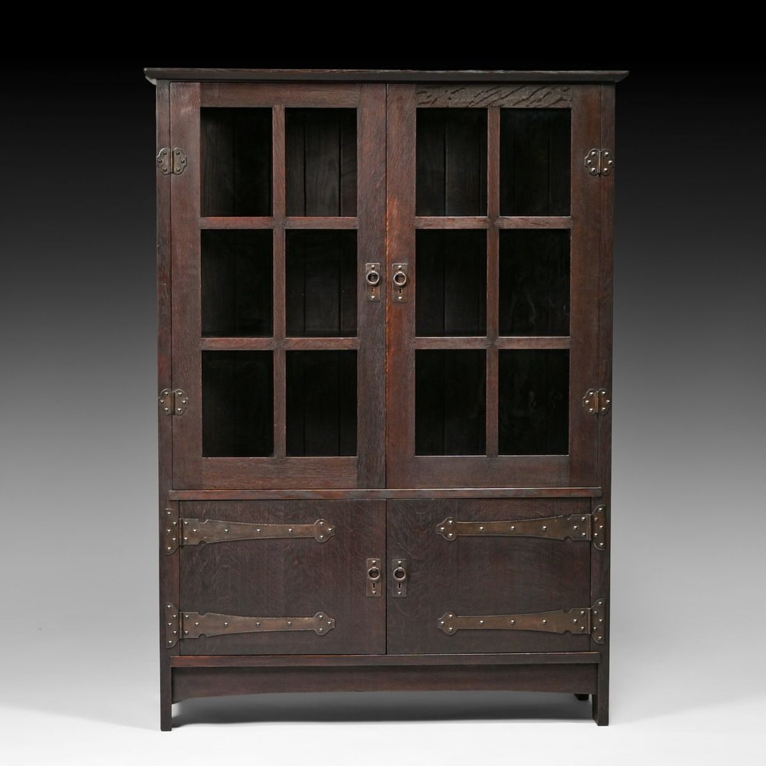 Early Gustav Stickley Strap-Hinge Miter Mullion China Cabinet c1902: Early Gustav Stickley Strap-Hinge Miter Mullion China Cabinet c1902. Unsigned. Professional conservation to chamfered back panel. Excellent original finish. 68.5"h x 49.5"w x 20"d FREE NATIONWIDE