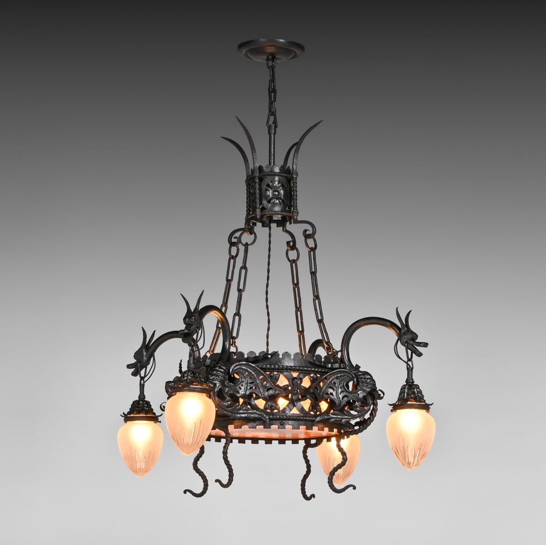 French Gothic Revival Art Nouveau Hand-Forged Iron Dragon Chandelier c1900s: French Gothic Revival Art Nouveau Hand-Forged Iron Dragon Chandelier c1900s. Unsigned. Excellent original patina. 48"h overall x 36"d FREE NATIONWIDE SHIPPING Free Nationwide Shipping within the