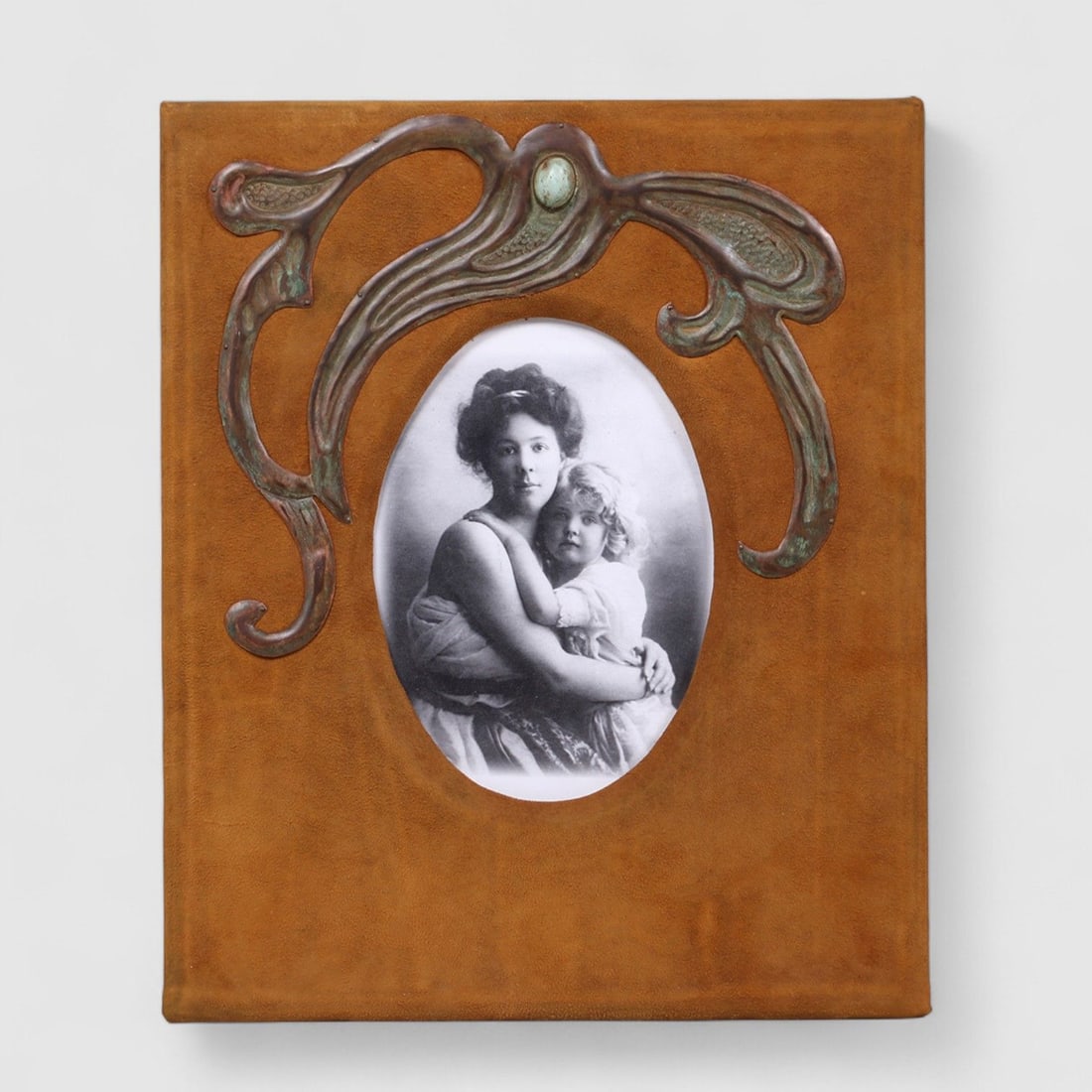 Elizabeth Eaton Burton Leather & Hammered Copper Eucalyptus Picture Frame c1910: Elizabeth Eaton Burton Leather & Hammered Copper Eucalyptus Picture Frame c1910. Signed. Professional conservation to suede leather. Excellent original patina. 14?h x 11.75?w (Picture 7.25?h x 5.25?
