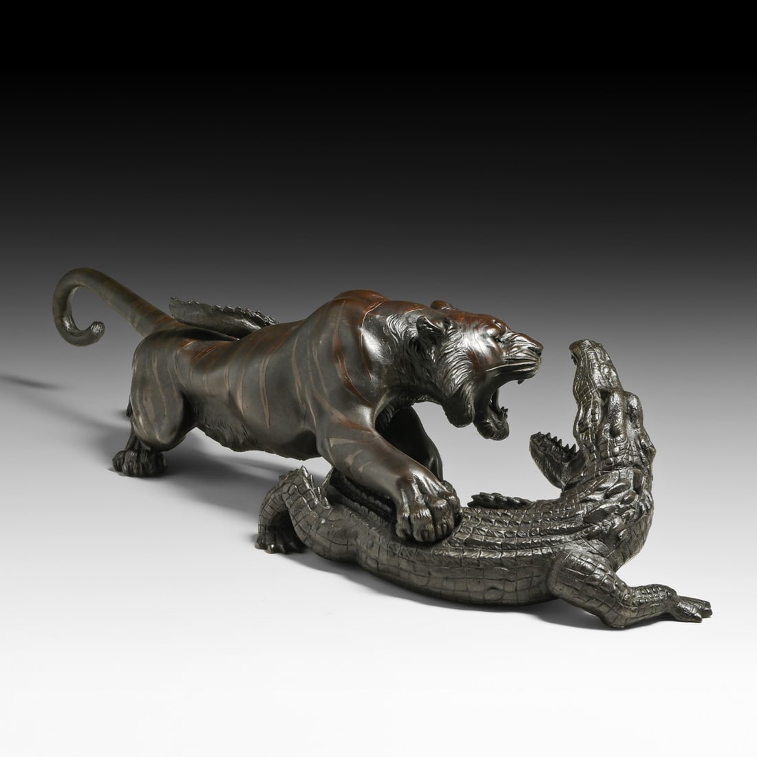 Japanese Meiji Period Bronze Okimono Tiger & Crocodile Battle, Studio of Genryusai Seiya: Japanese Meiji Period Bronze Okimono Tiger & Crocodile Battle, Studio of Genryusai Seiya (???????) c1880s. Signed. Excellent original patina. 25.25" x 6.75"h x 6.5"w FREE NATIONWIDE SHIPPING Free Nati