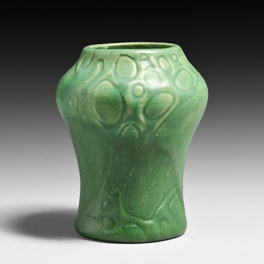 Japanese Art Pottery Matte Green Carved Vase c1910: Japanese Art Pottery Matte Green Carved Vase c1910. Unsigned. Nearly invisible restoration to base chips. 4.5"h x 3.5"d FREE NATIONWIDE SHIPPING Free Nationwide Shipping within the lower 48 states