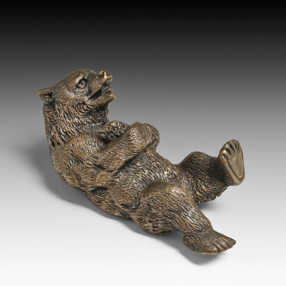 Arts & Crafts Period Bronze Reclining Bear Paperweight c1900s: Arts & Crafts Period Bronze Reclining Bear Paperweight c1900s. The sculpture features a highly tactile "ruffled fur" texture, consistent with the styles of the Russian St. Petersburg foundries (e.g.,