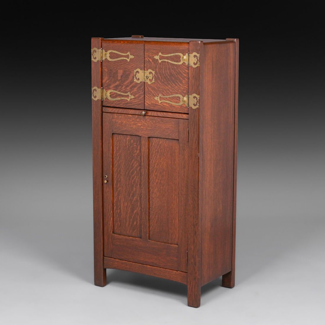 Grand Rapids Oak & Cutout Brass Cellarette c1910: Grand Rapids Oak & Cutout Brass Cellarette c1910. Unsigned. Very nicely refinished. 49.25"h x 24.25"w x 14.5"d FREE NATIONWIDE SHIPPING Free Nationwide Shipping within the lower 48 states for all