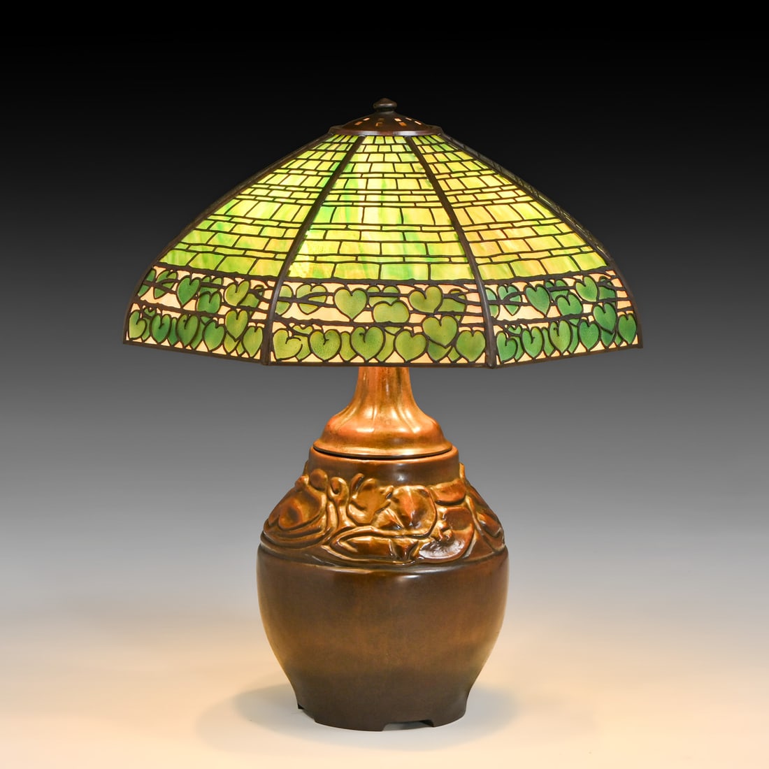 Handel Overlay Geometric Heart-Leaf Border Lamp c1910: Handel Overlay Geometric Heart-Leaf Border Lamp c1910. Both base and shade signed. Excellent new patina. Original curved glass in perfect condition. 26.5"h x 20.5"d FREE NATIONWIDE SHIPPING Free Natio