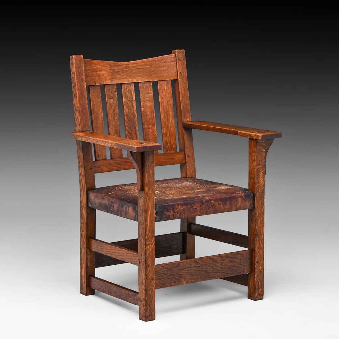 Gustav Stickley V-Back Armchair c1910: Gustav Stickley V-Back Armchair c1910. Signed. Excellent original finish and original leather. Rock solid sturdy. 35.75"h x 25.75"w x 20.5"d FREE NATIONWIDE SHIPPING Free Nationwide Shipping within