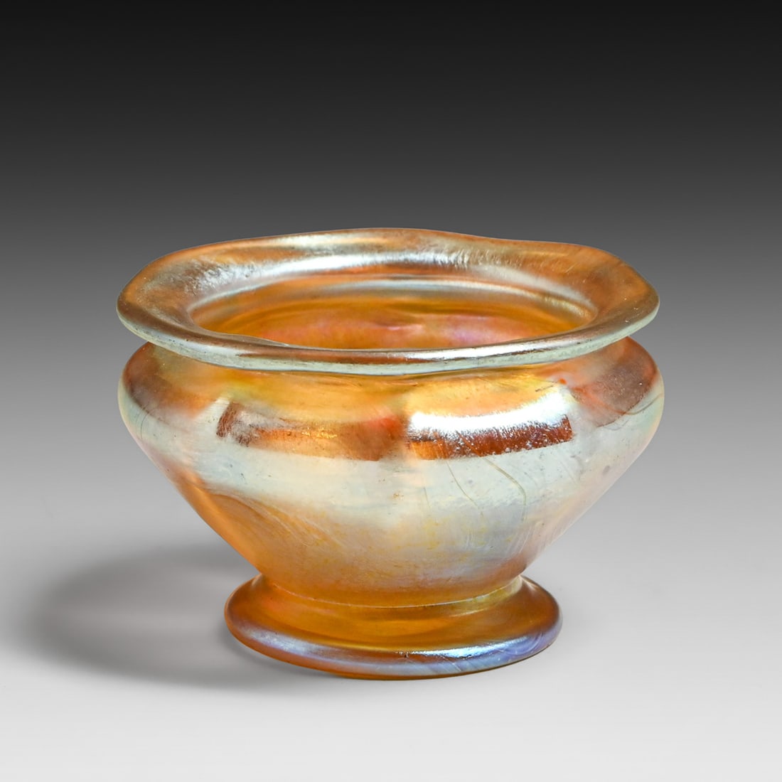Tiffany Studios Gold Favrile Art Glass Salt c1910: Tiffany Studios Gold Favrile Art Glass Salt c1910. Signed. Perfect condition. 2.25"d x 1.5"h FREE NATIONWIDE SHIPPING Free Nationwide Shipping within the lower 48 states for all purchases at our