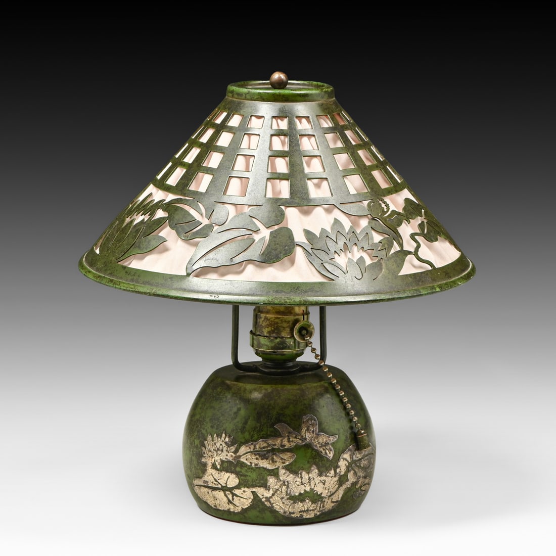 Heintz Sterling on Bronze Cutout Lamp c1910s: Heintz Sterling on Bronze Cutout Lamp c1910s. Signed. Excellent original green patina . 10.25"h x 9.25"d FREE NATIONWIDE SHIPPING Free Nationwide Shipping within the lower 48 states for all purchases