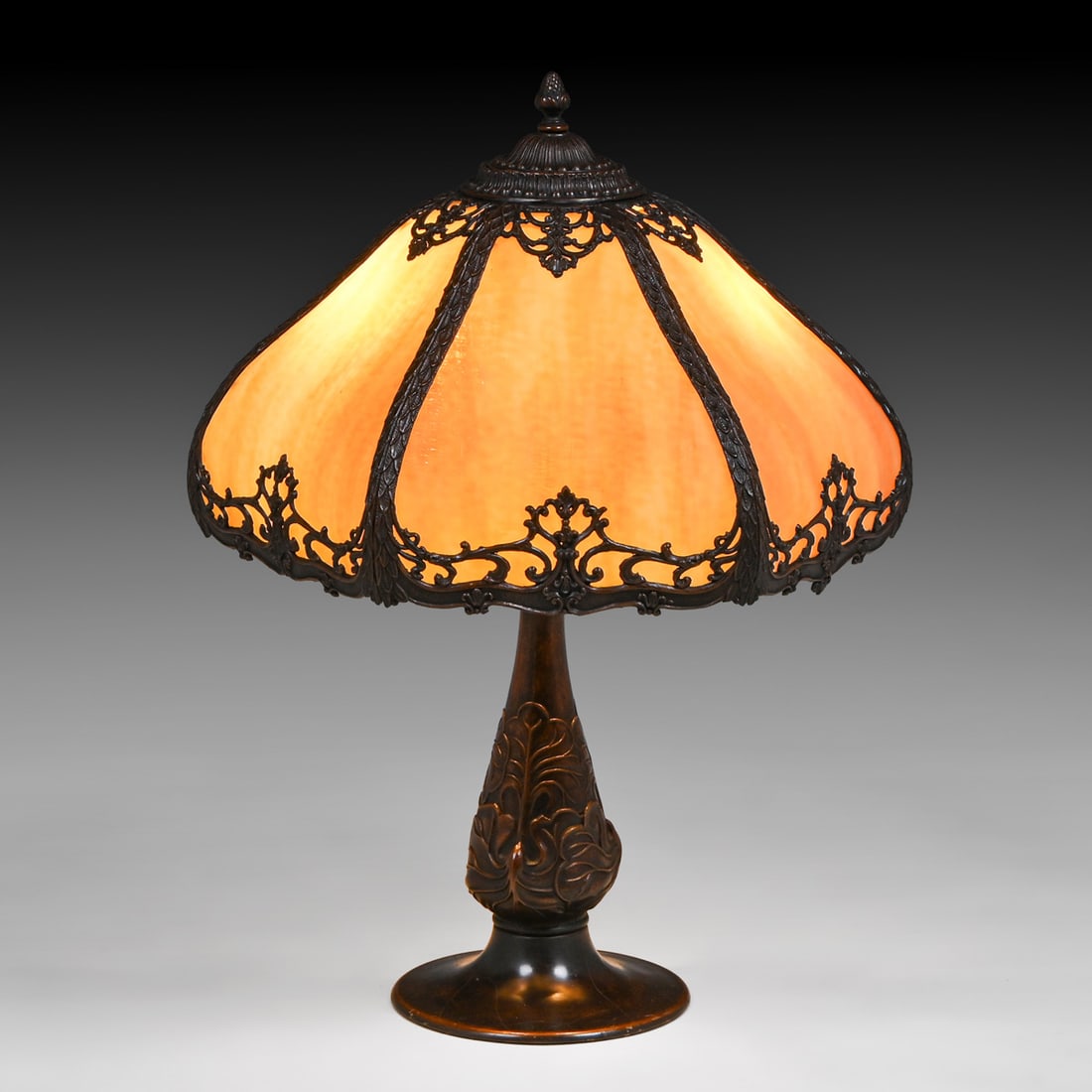 Bradley & Hubbard Caramel Curved Glass Table Lamp c1910: Bradley & Hubbard Caramel Curved Glass Table Lamp c1910. Stamped "B&H" emblem and mold number "1709" on the cast underside of the base. Excellent original condition with original curved glass in perfe