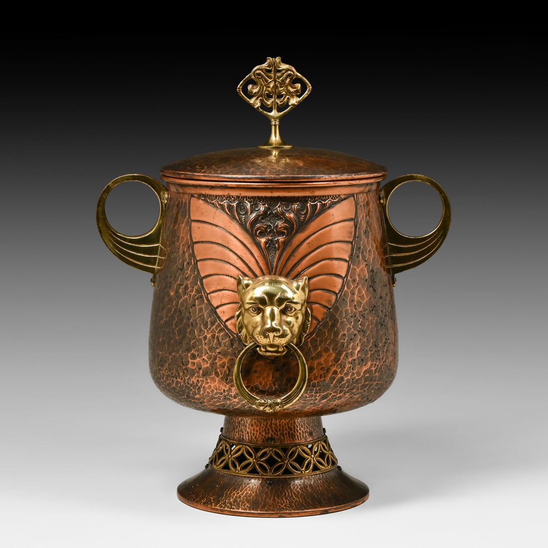 WMF - German Art Nouveau Hammered Copper & Brass Lion Mask Handled Punch Bowl c1905: WMF - German Art Nouveau Hammered Copper & Brass Lion Mask Handled Punch Bowl c1905. Signed. Excellent original patina. This is one of the nicest examples of WMF metalwork we have ever offered. 17.5"h