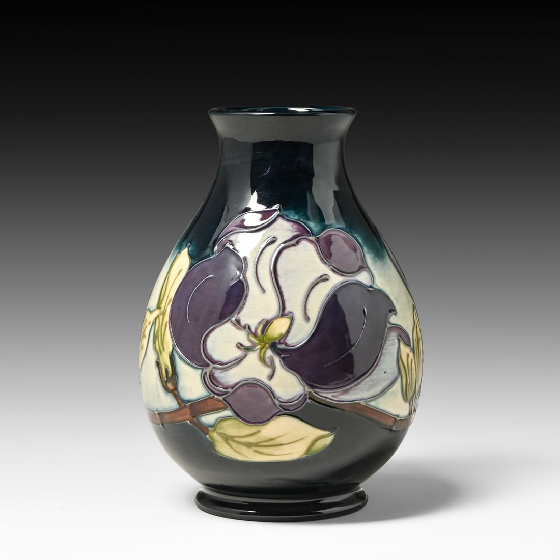 Moorcroft Pottery Magnolia Vase 1992: Moorcroft Pottery Magnolia Vase 1992. Signed.Perfect condition. 7.25"h x 5.25"d FREE NATIONWIDE SHIPPING Free Nationwide Shipping within the lower 48 states for all purchases at our Two-Day Auction. S