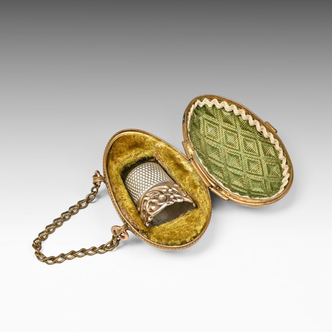 Ketcham & McDougall 14K Gold & Sterling Silver Size 8 Thimble & Palais Royal Case c1895: Ketcham & McDougall 14K Gold & Sterling Silver Size 8 Thimble & Palais Royal Case c1895. Signed. Excellent condition. 1"h x 0.75"d. Woven-pattern egg form case w/ chain 2"h x 1.25"d FREE NATIONWIDE