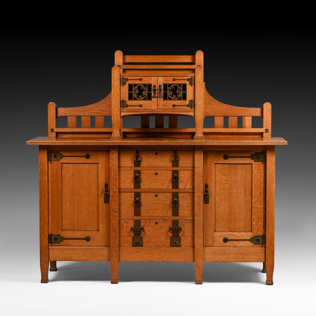 Large Stickley Brothers Oak Sideboard c1910: Large Stickley Brothers Oak Sideboard c1910. Cutout lion motif and strap-hinges. Unsigned. Excellent original finish. 63.5”h x 69.5”w x 22”d FREE NATIONWIDE SHIPPING Free Nationwide 