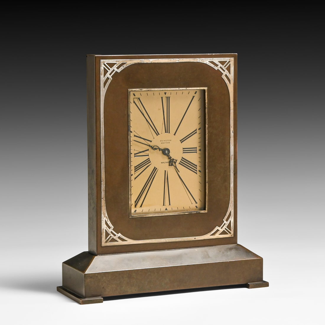 Silvercrest Sterling Silver on Bronze Table Clock c1920s: Silvercrest Sterling Silver on Bronze Table Clock c1920s. Signed. Excellent original patina. 10"h x 8.5"w x 3"d FREE NATIONWIDE SHIPPING Free Nationwide Shipping within the lower 48 states for all