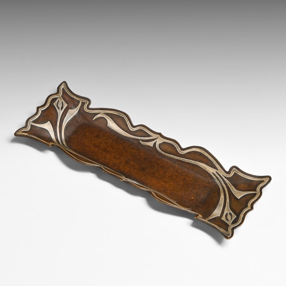 Early Heintz Sterling on Bronze Pen Tray c1910: Early Heintz Sterling on Bronze Pen Tray c1910. Marked only with impressed "Sterling". Excellent new patina. 9.75" x 4.5". This is lot is just for the pen tray. FREE NATIONWIDE SHIPPING Free