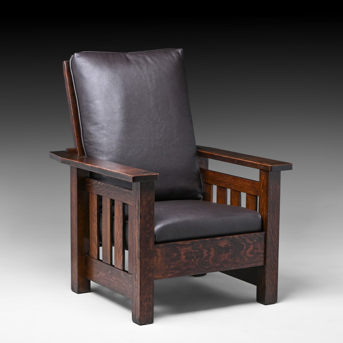 Lifetime Furniture Co Slatted Oak Morris Chair c1910: Lifetime Furniture Co Slatted Oak Morris Chair c1910. Signed only with Paine Furniture Retailer's Label. Excellent dark original finish. 42.5"h x 32.25"w x 35.5"d FREE NATIONWIDE SHIPPING Free Nationw
