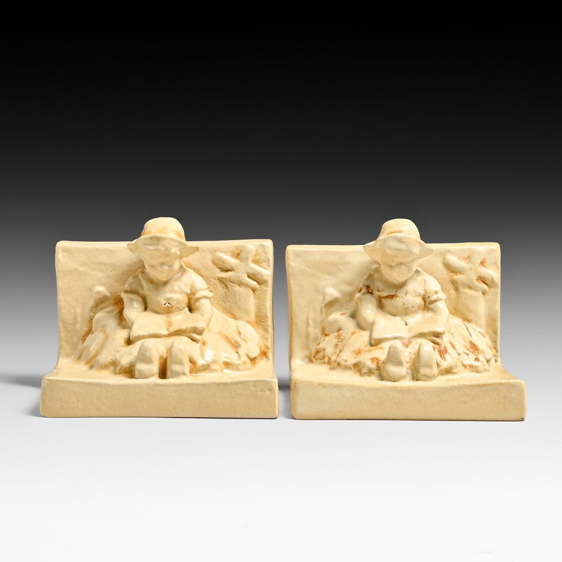 Teco Pottery Pair Children Reading Figural Bookends c1910 - 2