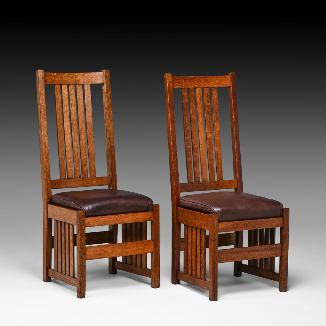 Pair L&JG Stickley Tallback Slatted Side Chair c1908-1912: Pair L&JG Stickley Tallback Slatted Side Chair c1908-1912. Signed. Excellent original finish. Rock solid sturdy. 45"h x 19.25"w x 22.5"d FREE NATIONWIDE SHIPPING Free Nationwide Shipping within the lo