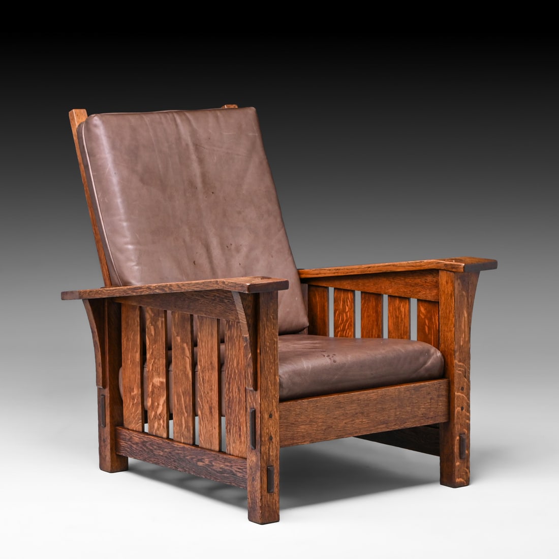 Gustav Stickley #369 Oak Bentarm Slatted Morris Chair c1910: Gustav Stickley #369 Oak Bentarm Slatted Morris Chair c1910. Unsigned. Excellent original finish. 20 year contemporary leather with stains to seat. Very comfortable and sturdy. 40"h x 32"w x 37.5"d FR