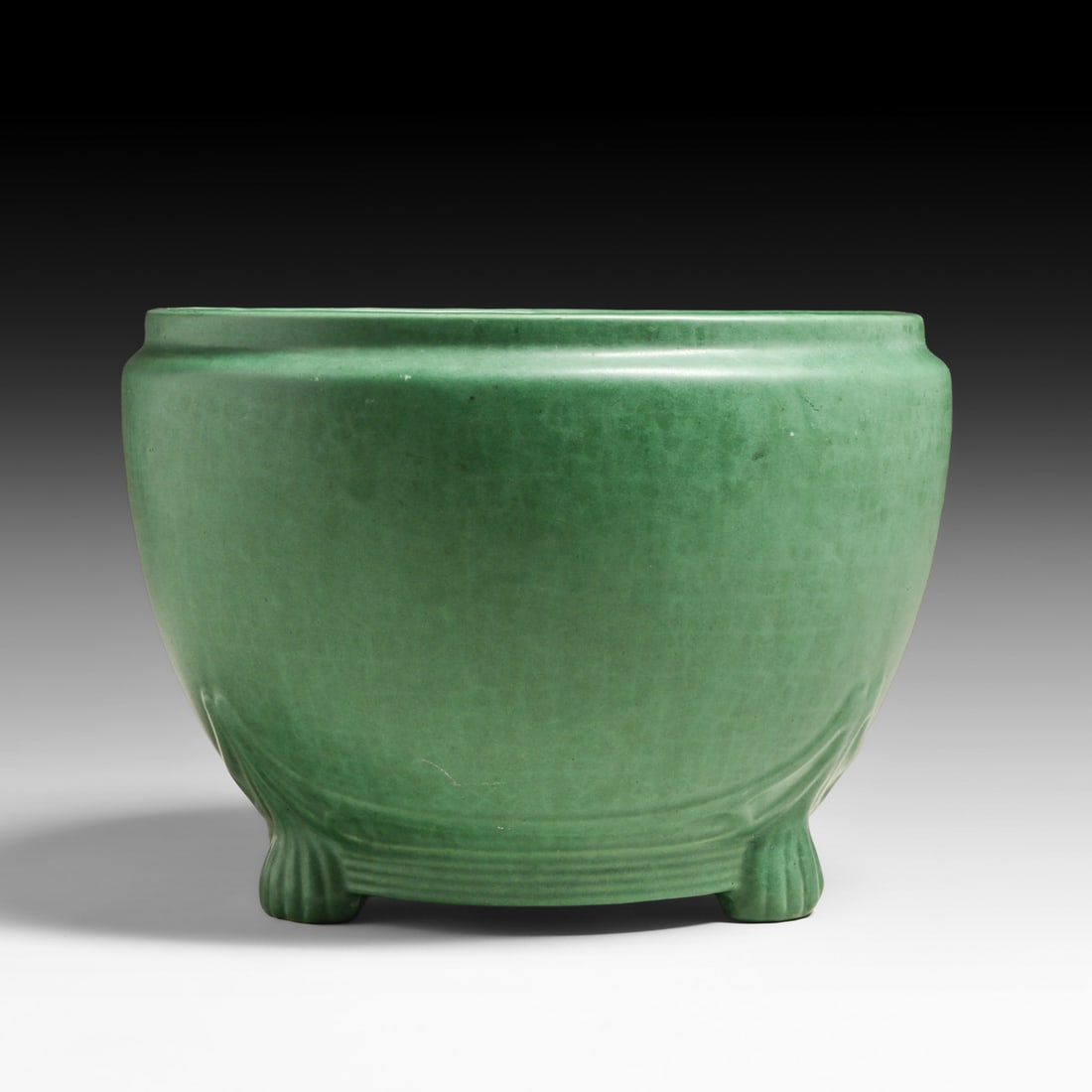 Weller Pottery Matte Green Footed Jardiniere c1910s: Weller Pottery Matte Green Footed Jardiniere c1910s. Unsigned. In-body 1"+ diameter bruise to one side. 7.5"h x 11"w FREE NATIONWIDE SHIPPING Free Nationwide Shipping within the lower 48 states for al