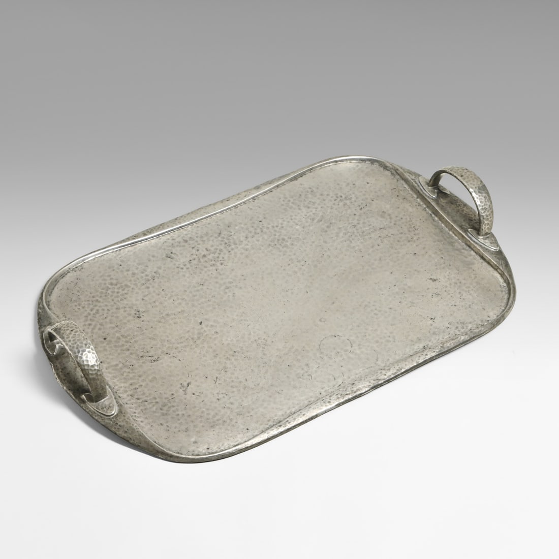Liberty & Co Archibald Knox #043 "Tudric" Hammered Pewter Tray c1902: Liberty & Co Archibald Knox #043 "Tudric" Hammered Pewter Tray c1902. Signed. General overall wear to surface with an excellent original patina. 18.75"w x 11.5"d x 2.75"h FREE NATIONWIDE SHIPPING