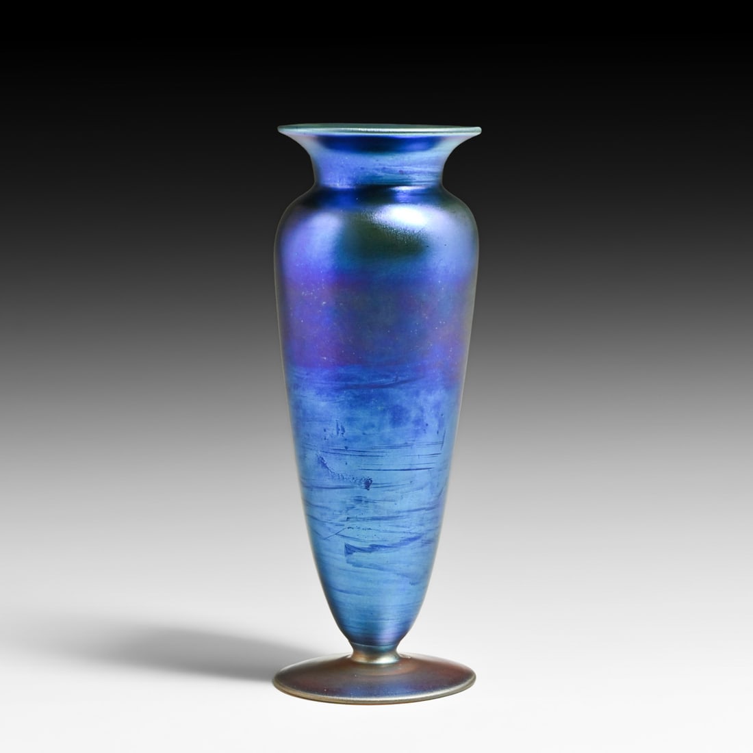 Iridescent Blue Art Glass Trumpet Vase c1920s.: Iridescent Blue Art Glass Trumpet Vase c1920s. Unsigned. Perfect condition. 8.25"h x 3"d FREE NATIONWIDE SHIPPING Free Nationwide Shipping within the lower 48 states for all purchases at our Two-Day A