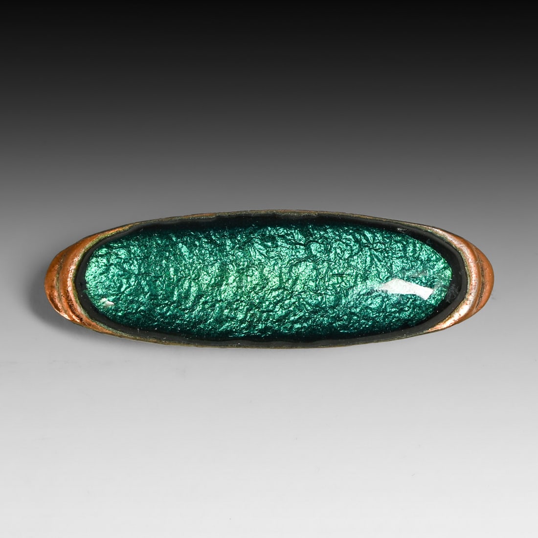 Arts & Crafts Enameled Copper & Emerald Green Glass Brooch c1910s: Arts & Crafts Enameled Copper & Emerald Green Glass Brooch c1910s. Unsigned. 2"w x 0.5"h FREE NATIONWIDE SHIPPING Free Nationwide Shipping within the lower 48 states for all purchases at our Two-Day