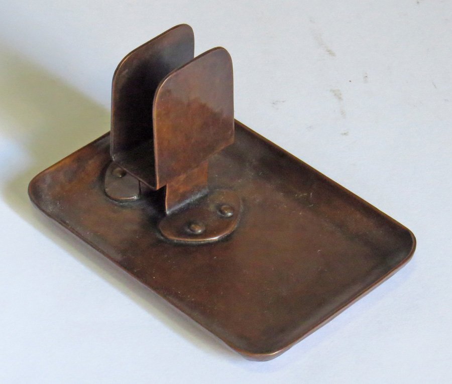 Dirk van Erp - D'Arcy Gaw Hammered Copper Ashtray: Dirk van Erp - D'Arcy Gaw hammered copper rectangular ashtray with radial hammering and attached match box holder. Impressed Dirk van Erp - D'Arcy Gaw mark. 2.75"h x 5" x 3.5"w. Exhibited Bay Area Cop