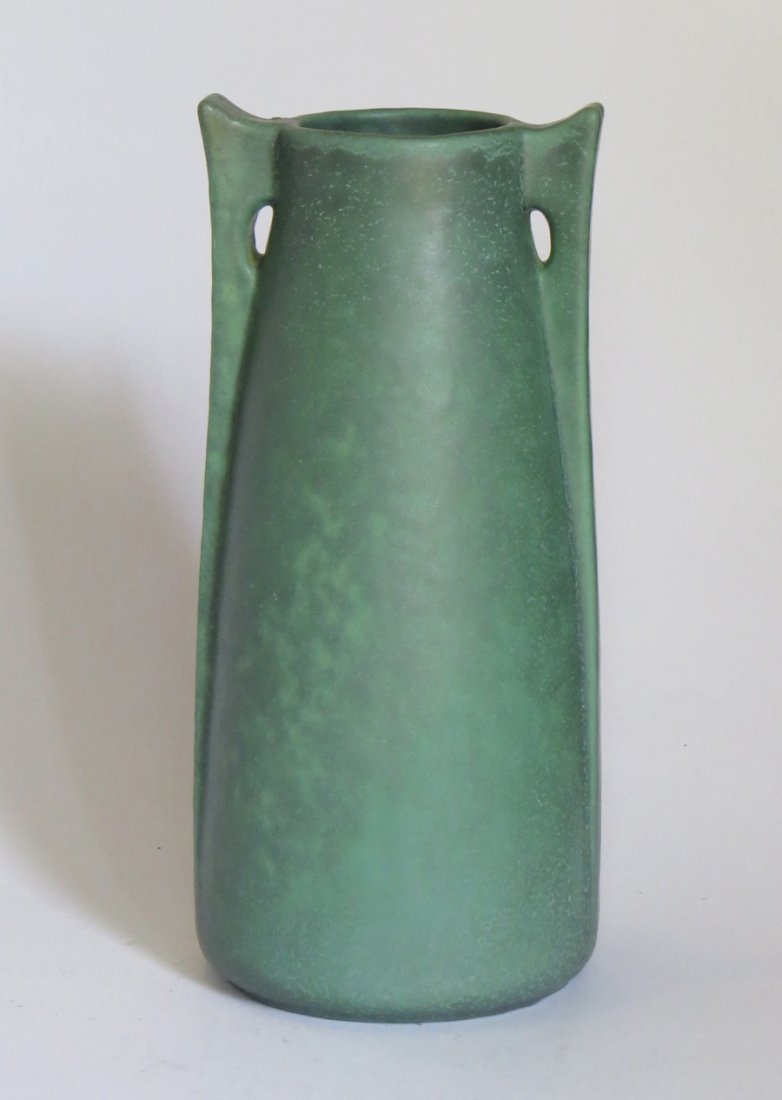 Tall Teco Matte Green Two-Handle Vase: Tall Teco matte green two-handle vase #266. Impressed "Teco" and incised "266" on bottom. 11.25"h x 5"d. Shipping: We box and ship ourselves, to keep shipping costs low. We do not use a packaging serv