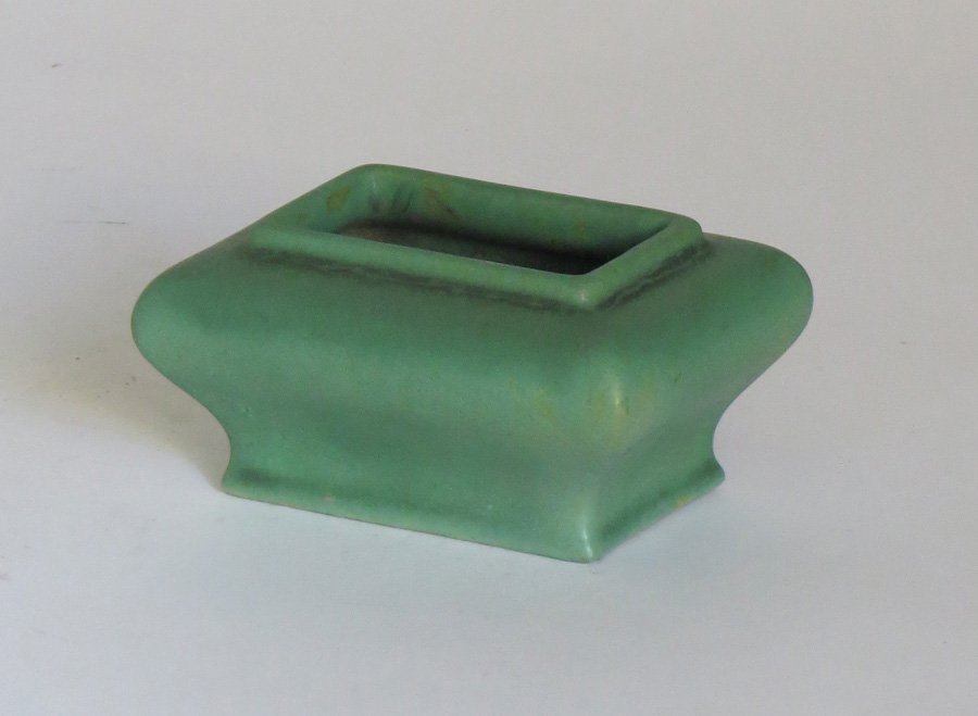 Teco Matte Green Rectangular Vase: Small Teco matte green rectangular vase. Impressed "Teco" on bottom. 1.75"h x 3.5" x 2.5".