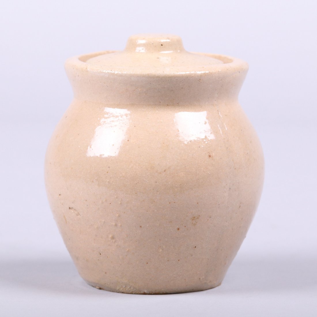 Roycroft Stoneware Honey Pot with Lid: Roycroft stoneware honey pot with lid. Signed "The Roycroft Shop East Aurora, NY". 4.5"h x 4"d. This lot is being sold to benefit The Dirk van Erp Foundation. We box and ship ourselves, to keep shippi