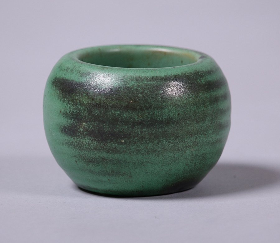 Small Teco Matte Green Vase: Small Teco matte green vase. Impressed Teco mark. 1 7/8"h x 2.5"d.