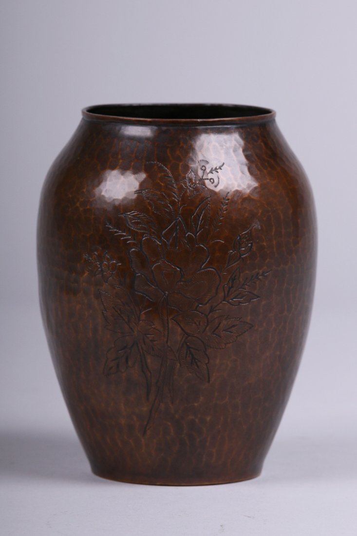 Armen Hairenian Hammered Copper Vase: Armen Hairenian hammered copper vase with chased floral design. When we acquired this vase it was polished and the "A. Hairenian 29" that was scratched on the bottom was just barely visible. After rep