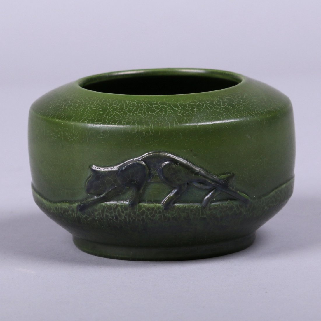 Ephraim Faience Matte Green Panther Vase: Ephraim Faience matte green panther vase by John M. Raymond. 4.75"d x 3"h.