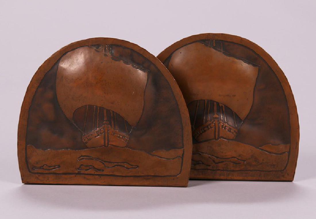 Harry Dixon Hammered Copper Acid-Etched Ship Bookends: Harry St John Dixon hammered copper acid-etched galleon ship bookends c1921-1925. Excellent original patina. Signed with incised mark "HDixon San Francisco". 5.75"h x 6.25"w. We box and ship ourselves