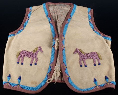 Plains Indian Beaded Child's Vest with Horses: Native American Northern Plains pictorial beaded child's vest, early 20th Century, beaded front and back on soft tanned hide, horses showing on front. Turn of century trade cloth inside. 14inches tall