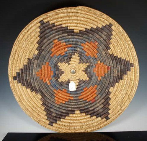 Monumental Navajo Wedding Basket: A centerpiece ideal for display. Dimensions: 26 & 3/4 in. diameter, 3 in deep. Because of the huge size of this piece it requires third party shipping
