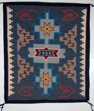 Teec Nos Pos Regional Style Sampler Navajo Rug,: Sampler-sized Teec Nos Pos Navajo rug, finely and tightly woven. Would display well as a wall hanging, table throw, etc. Dimensions: 24 & 1/4 in. wide x 28 & 5/8 in. long.