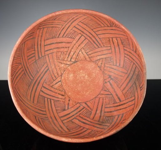 Giant Anasazi St. John's polychrome bowl: A very large Native American, Anasazi black on red Anasazi St. John's pottery bowl, 1150 AD - 1300 AD. 5 3/4 inches tall and 12 inches diameter. This giant bowl has bold painted interlocking basket we