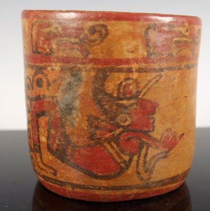 Pre-Columbian Mayan Copan cylinder: A sweet pre-Columbian, Maya polychrome cylinder from Copan. This cute cylinder measures 4.25 inches tall and 4.25 inches diameter. The stone polished surface is panted with seated Chiefs and a swimmer