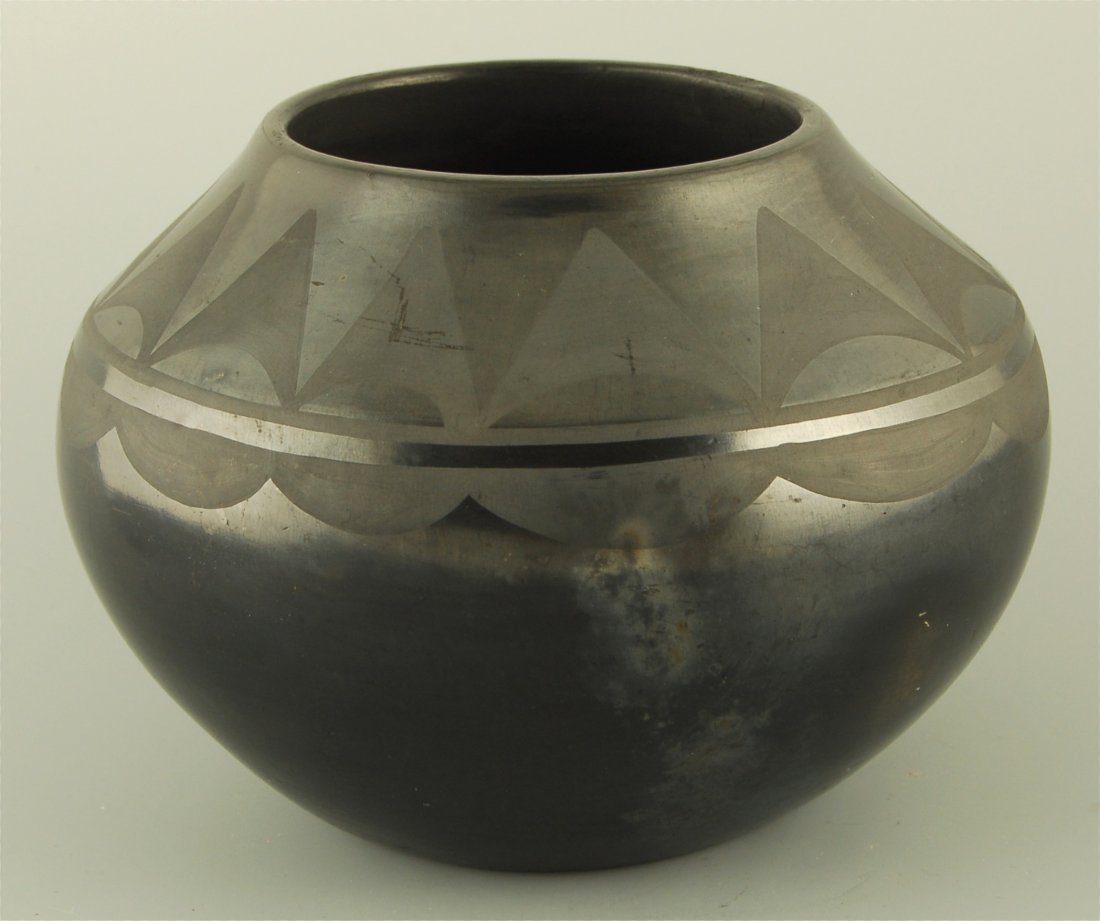 Tonita Roybal San Ildefonso Bowl: Bowl with triangular arrowhead pattern, signed Tonita. Chip on rim. Ex collection Richard Howard, circa 1920's. 7" w x 5" h. Native American