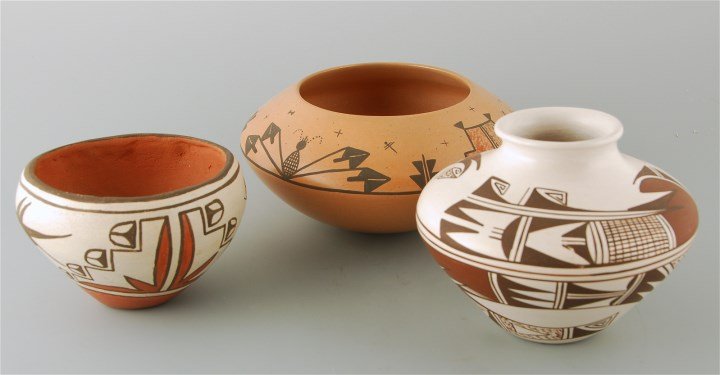 Hopi and Zia pottery group: Native American White ware Hopi jar by Donna Robertson, signed with frog and DR hallmark, 4" h x 5" w. Zia bowl with roadrunner signed Alvin Pino, 3" h x 4.25" w. Preston Duwyenie Hopi painted bowl si