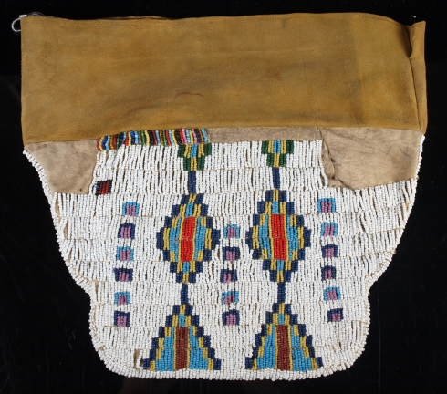 Native Cheyenne Beaded Hide Tee-Pee Bag: Graphic flat bag, turn of the century or slightly thereafter. Beaded on both sides in a classic vertically-stepped pattern, flanked by horse tracks on one side, and box devices on the other. The flare