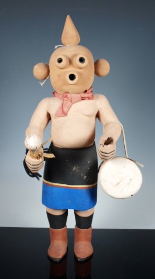 Hopi Mudhead Katsina Kachina by Peter Shelton: Charming, large Mudhead Katsina Kachina doll by Hoyesva (Peter Shelton), c. 1960's. Cottonwood doll carries an oversized drum and a rattle with hide-wrapped handle. Pot bellied, wearing a red cloth sc
