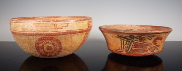 Two Pre-Columbian Mayan bowls: Pre-Columbian, Maya Territories, Ca 550 to 900 CE. A classic Honduras Maya painted bowl 6 3/4" dia. with zoomorphic creatures painted on the inside rim and geometric designs to the exterior. The other
