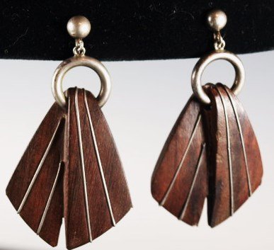 William Spratling Taxco Silver & wood earrings: William Spratling wood and silver earrings, screw on backs, 2" long. Market "William Spratling Taxco Mexico .925" Marked on inside of screw back. A nice pair of earrings by the master of Taxco silver.