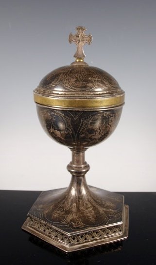 Important 19th Century chalice by Josep Ignasi: A very important silver and gold washed chalice made by famous silversmith Josep Ignasi Ginabreda. 9 1/2 inches tall. Marked Ginabreda on bottom with St. Philomina who was a younf virgin martyr. On th