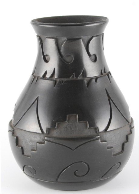 Ryan Roller Santa Clara Jar: Ryan Roller Santa Clara. Great-grandson of Margaret Tafoya fully carved water jar. 5.25”w x 7.25”h