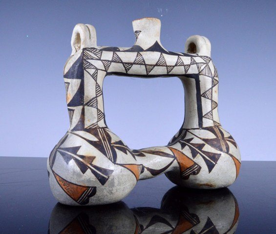 Early Double chambered Acoma canteen Ex-Sotheby's: Origin: Native American, American Indian TRIBE: Acoma Pueblo New Mexico. PROVENANCE: Sotheby's New York, MAy 2000 lot 473, from the Collection of Leslie Margulis.