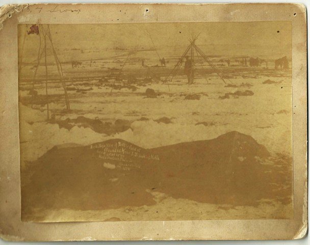 LARGE VIEW OF CAMP AT WOUNDED KNEE BATTLEFIELD – ca. Ja: "LARGE VIEW OF CAMP AT WOUNDED KNEE BATTLEFIELD – ca. Jan. 1st, 1891. Stark image of the Wounded Knee Battlefield showing the camp of Big Foot, visible left rear with portable furnace still standing