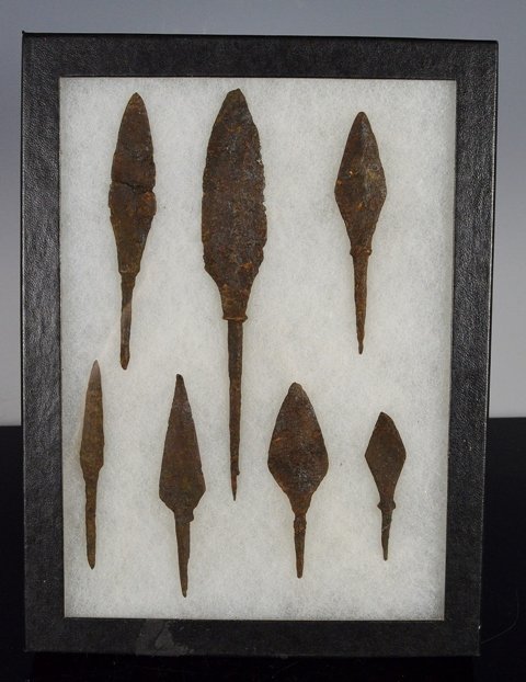 Ancient Greco-Roman Bronze Spear Heads: 7 Ancient Greco-Roman Bronze & Iron Spear Heads. Comprised of leaf shaped spear heads and dating approximately to the Greek Bronze Age ( 600 BC - 100 AD). Comes in glass Riker case. 5 3/8 inches long 